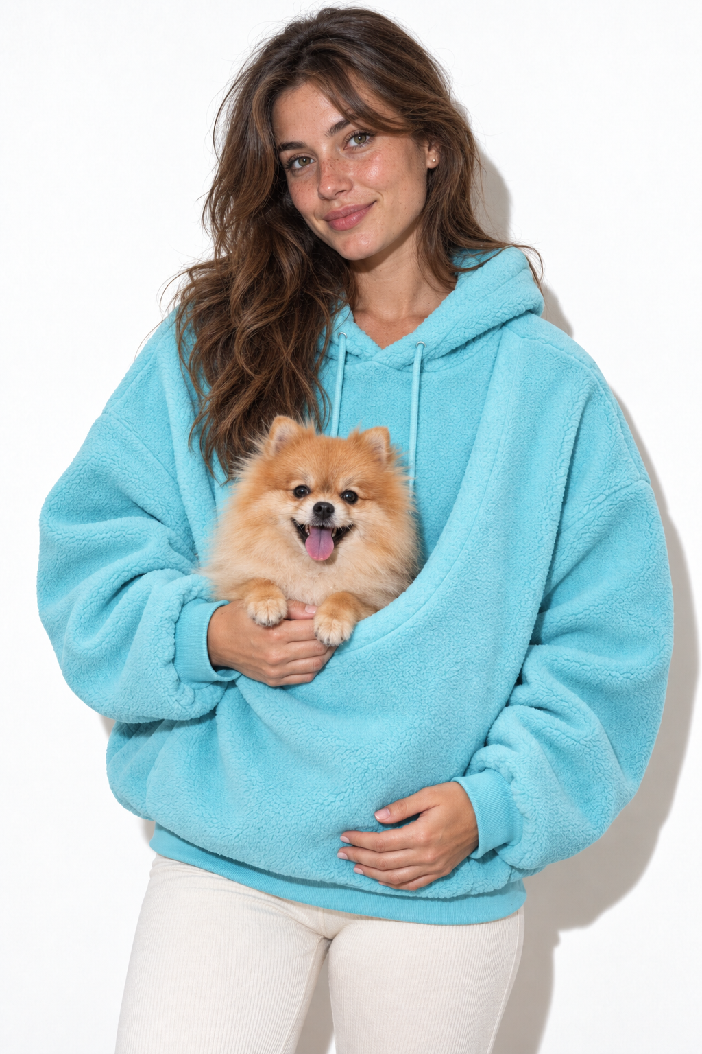 Sky Blue Pawttle Cuddle Hoodie modeled with a small dog