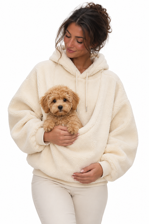 Milky White Pawttle Cuddle Hoodie modeled with a small dog against a white studio background